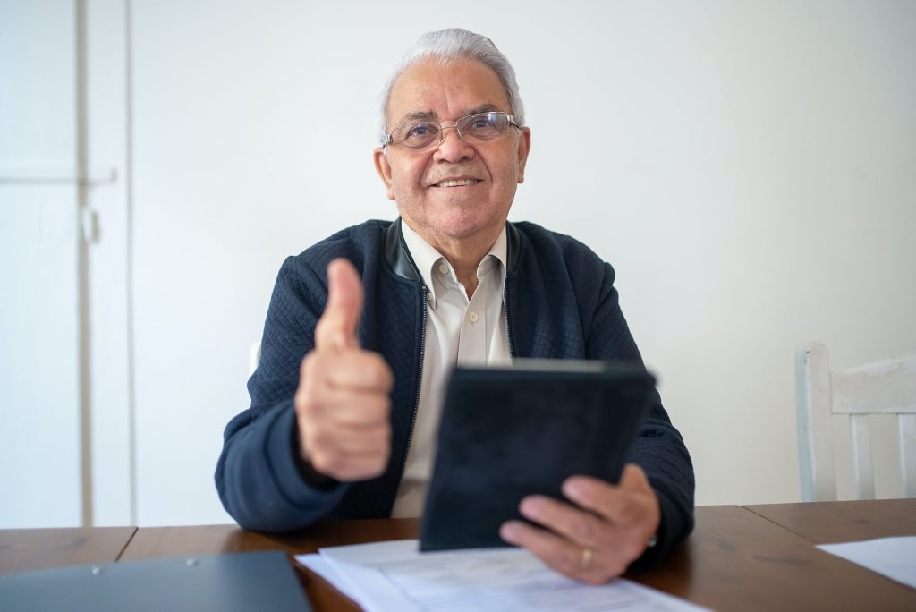 old gentleman giving thumbs up